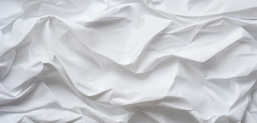 Close-up of a background made of crumpled white paper, abstract, copy space.