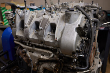 Engine valve car maintenance. The cylinder block of the four-cylinder engine. Disassembled motor...