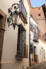 Narrow cobblestone streets and beautiful houses of Ronda city