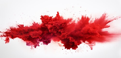 Create a visually stunning scene with a red powder explosion abstract over a white background, showcasing isolated red powder splatters that add a burst of color and energy.