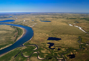 Spring circumpolar tundra with swamps, lakes and rivers in June.