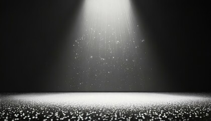 twinkling glitter falling on a flat surface lit by a bright spotlight elegant black and white stage...