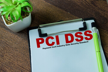 Concept of PCI DSS - Payment Card Industry Data Security Standard write on paperwork isolated on...