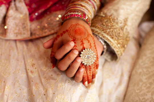 A couple holding in hand at wedding day. Indian couple holding hand on their wedding