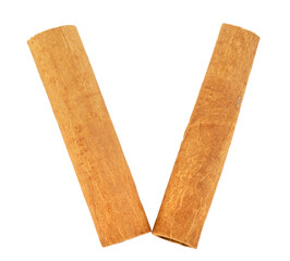 Cinnamon sticks, Roman numeral five concept, isolated on white background.