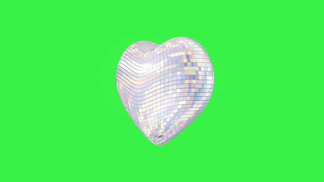 Seamless loop 3d animation of a silver disco heart isolated on a green background.