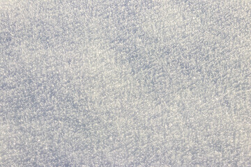 Fototapeta na wymiar Texture of the white snow. Winter background