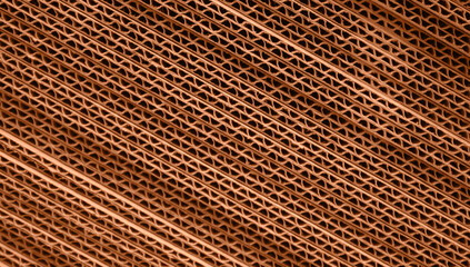 Natural background from a stack of cardboard panels colored in new trendy color of 2024 year Peach Fuzz. Side view. Monochrome. Wallpaper for blogs in social networks