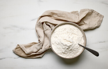 bowl of flour and linen towel