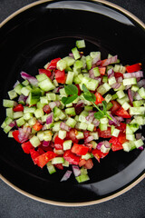 salad vegetable cucumber, tomato fresh vegetables healthy eating cooking appetizer meal food snack on the table copy space food background rustic top view