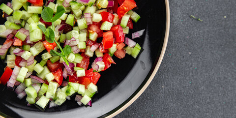 salad vegetable cucumber, tomato fresh vegetables healthy eating cooking appetizer meal food snack on the table copy space food background rustic top view