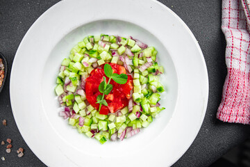 salad vegetable cucumber, tomato fresh vegetables healthy eating cooking appetizer meal food snack on the table copy space food background rustic top view