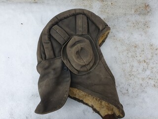Tankman's military helmet in the snow.