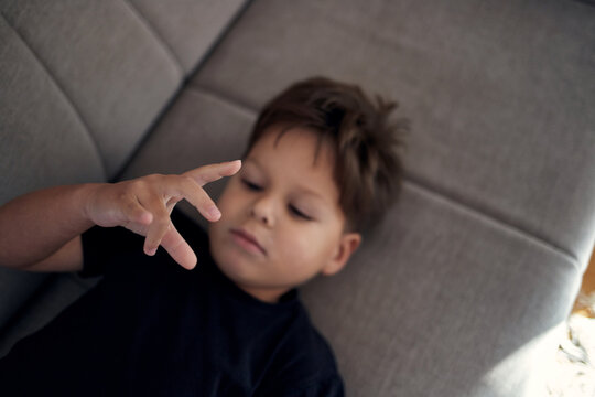 A boy with autism is stimming.