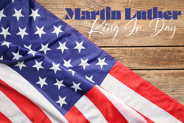 Fototapeta na wymiar USA flag on wooden background. Martin Luther King Jr. Day