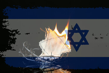 Burning Jewish badge with barbed wire on dark background. International Holocaust Remembrance Day