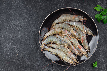 shrimp raw seafood fresh prawn cooking appetizer meal food snack on the table copy space food background rustic top view