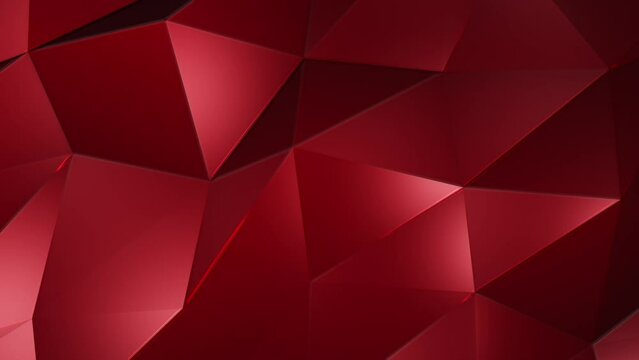 Futuristic red low poly surface background with the gentle motion of shiny polygonal triangle shapes and glowing red neon light. Full HD and looping abstract technology motion background animation.