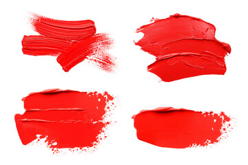 Red oil paint strokes isolated on white, top view