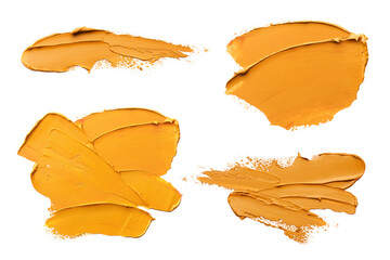 Orange oil paint strokes isolated on white, top view