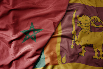 big waving national colorful flag of sri lanka and national flag of morocco .