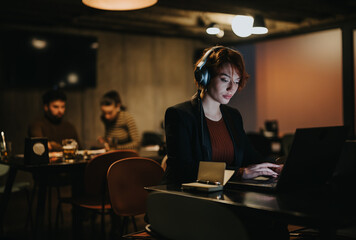 Business person analyzing sales statistics and planning marketing strategy for profit growth in corporate office. Working late, coordinating for market expansion.