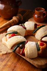 Three Kings Bread also called Rosca de Reyes, Roscon, Epiphany Cake, traditionally served with hot chocolate in a clay Jarrito. Mexican tradition on January 5th.