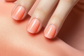 Beautiful nude manicure. Long almond shaped nails. Nail design. Manicure with gel polish. Close-up of the hands of a young woman with a gentle nude manicure on her nails. Peach fuzz nails