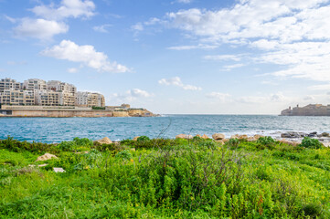 Sliema, major residential and commercial area and a centre for shopping, dining, and cafe life in Malta. Skyline in the Strand and Tigne Point during day as seen from Manoel Island