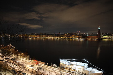 Stockholm Stunning Night Winter View. Town Hall, framed by Lake Malaren.