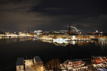 Stockholm Stunning Night Winter View. Nice downtown reflections in Lake Malaren. Beautiful picture.