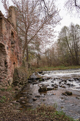 A waterfall formed after the destruction of an old mill