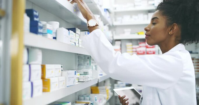 Pharmacy, stock and woman pharmacist with tablet, medicine or search for information, label or inspection. Pharma, retail and female doctor with box, pills or check, inventory or store management