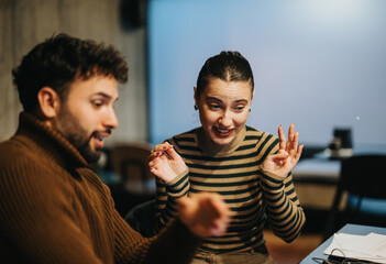 Business professionals discussing strategies, analyzing sales stats, and planning projects for...