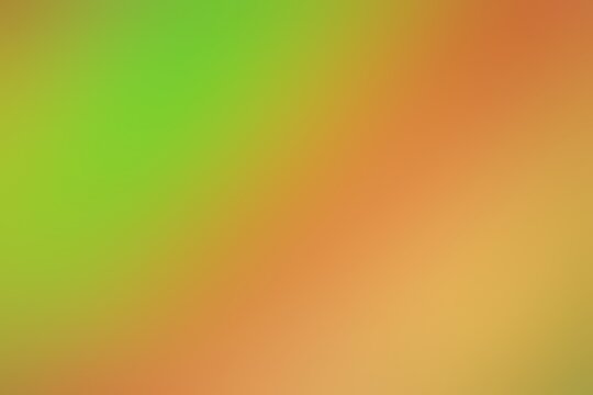 Abstract blurred background image of green, orange colors gradient used as an illustration. Designing posters or advertisements.