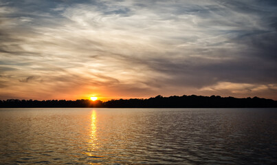 Idyllic sunset over the Swedish lake - 692239276