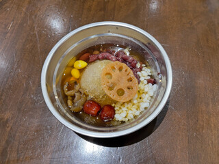 Cold assorted beans in syrup, famous Chinese dessert. Selective focus