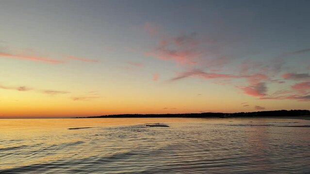 Calm Ocean Waves at Sunset on the Atlantic Ocean at Chatham, Cape Cod