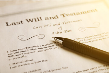 Last Will and Testament with pen, closeup