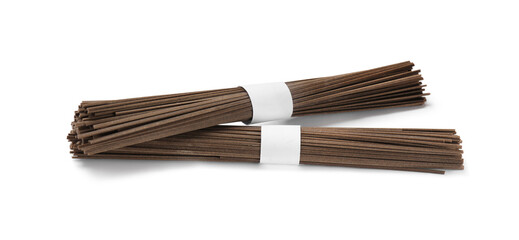 Uncooked buckwheat noodles (soba) isolated on white