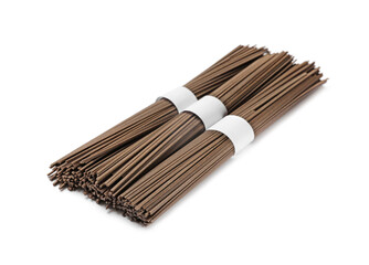 Uncooked buckwheat noodles (soba) isolated on white