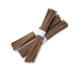 Uncooked buckwheat noodles (soba) isolated on white, top view