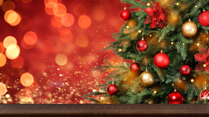 Fototapeta na wymiar Christmas tree decorated with red and golden balls near wooden table against blurred background. Banner design with space for text
