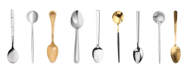 Foto op Plexiglas Stylish golden and silver spoons on white background © New Africa