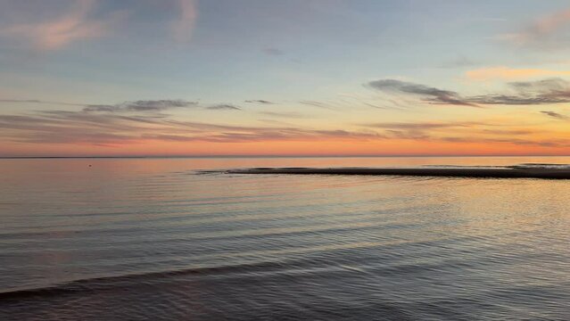 Calm Ocean Waves at Sunset on the Atlantic Ocean at Chatham, Cape Cod