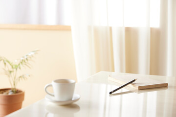 A cozy, bright room with sunlight streaming in.