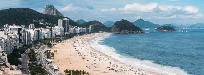 High perspective panoramic view of Copacabana Beach in Rio de Janeiro, Brazil with Sugarloaf...