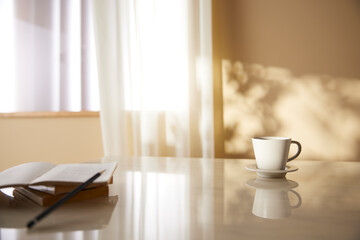 A cozy, bright room with sunlight streaming in.