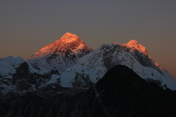 Last sunlight of the day touching the peaks of Mount Everest and Lhotse, Nepal.