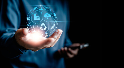 Businesswomen holding a virtual globe with ESG icon concepts for Environment, Social, Governance, net zero, carbon neutrality goals, development business sustainable environment concept.